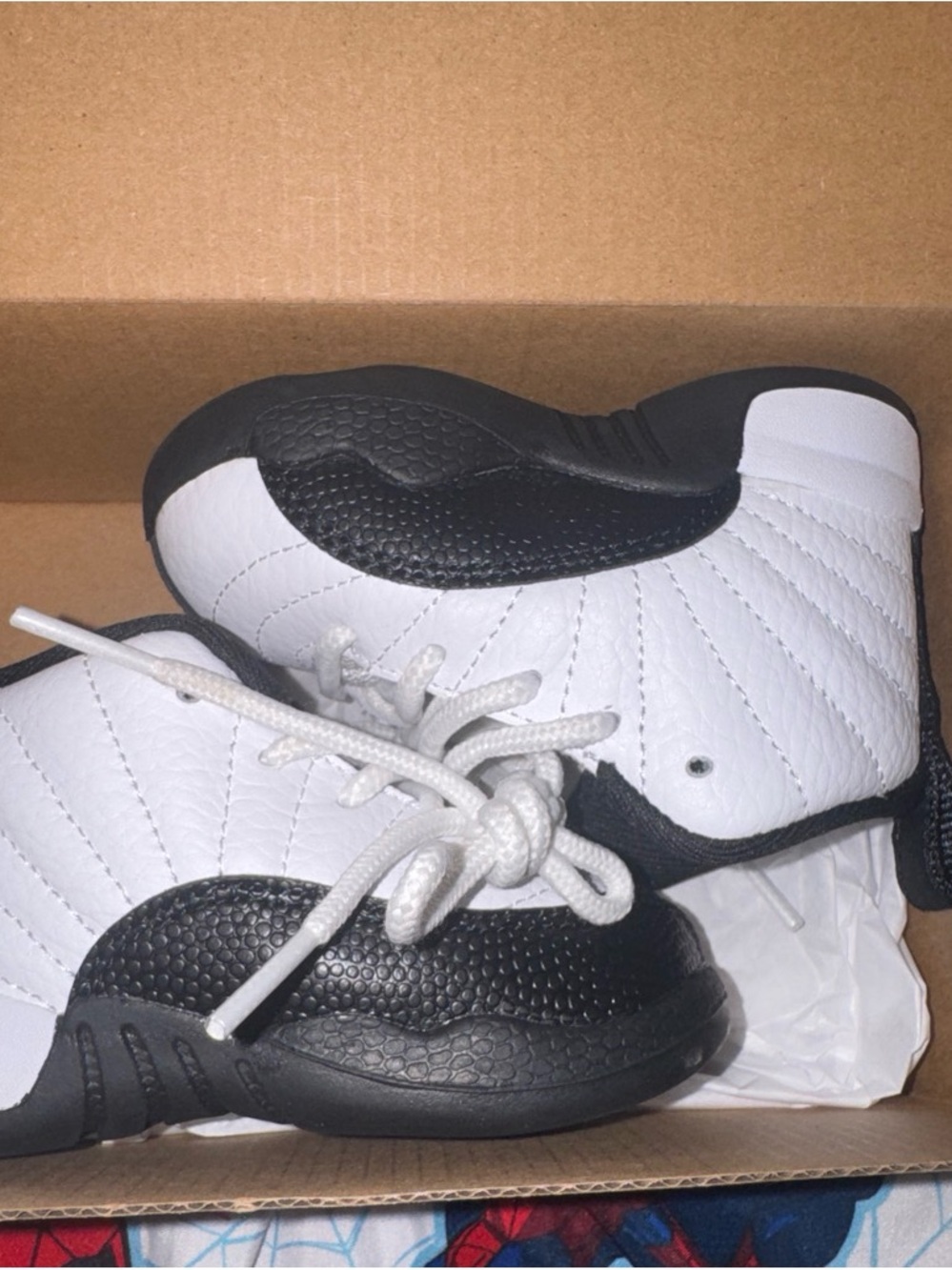 Jordan Kids Black and White High-Top Sneakers